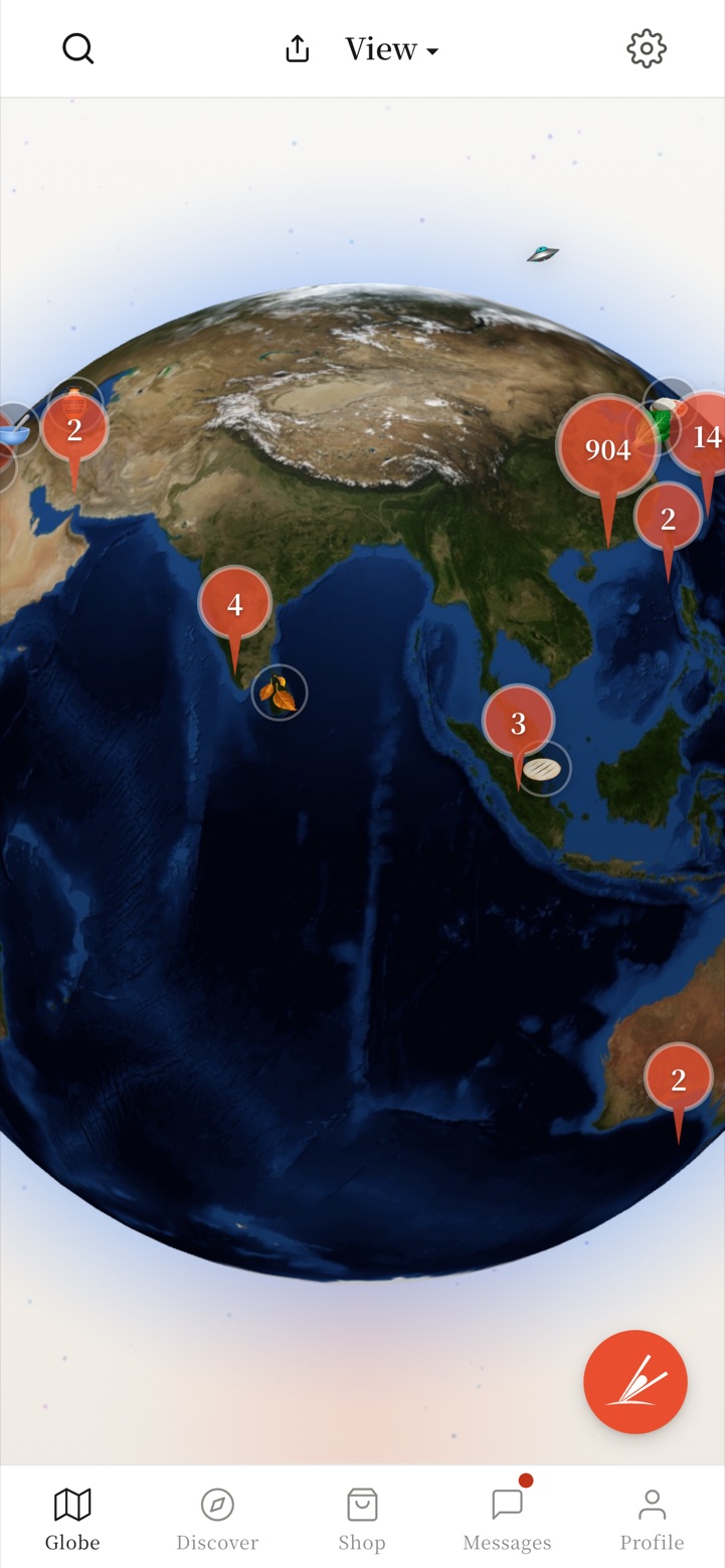 腹地笔记 App 地球页 — 3D globe with food footprints